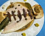 Foto del paso 11 de la receta Dorada en salsa de puerros, anchoas y alcaparras