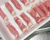 A picture of step 1 of Rolled Pork Cutlet (Kuru Kuru Tonkatsu) with Thinly Sliced Pork Loin.