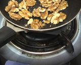 A picture of step 1 of Spicy Walnuts Masala Chicken Curry.
