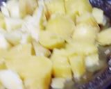 A picture of step 3 of Aloo ka bharta.