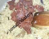 A picture of step 4 of Kilishi rice and green shredded beef.