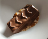 A picture of step 1 of Snicker Filled Dates.