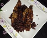 A picture of step 12 of Stuffed qeema kareela.