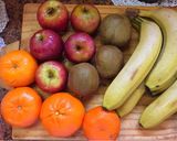 Foto del paso 1 de la receta: Gelatina de frutas 🥝🍊🍎🍌