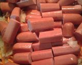 A picture of step 4 of Sweet and sour hotdog casserole.