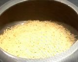 A picture of step 1 of Brown rice with chana masala.