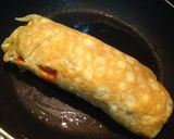 Foto del paso 11 de la receta: Rollitos de tortilla con salchichas