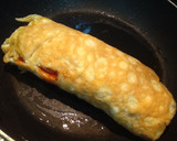 Foto del paso 11 de la receta: Rollitos de tortilla con salchichas