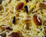 A picture of step 14 of Rakhi Special - Narali Bhat.