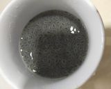 A picture of step 2 of Rooh Afza with basil.