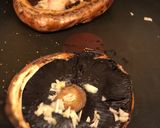 A picture of step 4 of Venison burger in a portobello mushroom “bun” 🍔🍟.