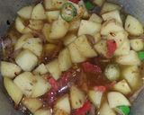 A picture of step 2 of Aloo saim phali.
