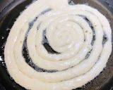 A picture of step 6 of Homemade Funnel Cakes.