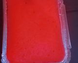 A picture of step 6 of Ty cakes, nice red coloured cake with foil tin.