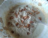 A picture of step 9 of Banana nut cake with chocolate frosting.