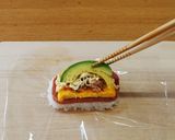 A picture of step 12 of Pork, Egg, Avocado & Tuna Onigiri.