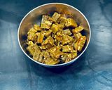 A picture of step 1 of Maharashtrian Thali For Lunch -Fry Bhindi, Bhhat,Varan, Kharda, Chapati, Kheer.