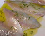 A picture of step 1 of Lemon and rosemary pan fried sea bass with sautèed potatoes.