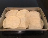 A picture of step 9 of Mexican Lasagna.