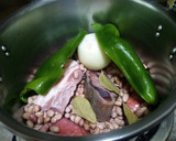 Foto del paso 2 de la receta: Alubias pintas con arroz en olla rápida