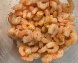 A picture of step 4 of Chicken, Shrimp, & Sausage with Alfredo Sauce on Angle Hair Pasta.