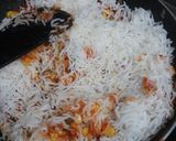 A picture of step 4 of Maxican corn rice.