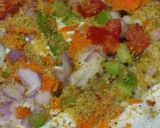 A picture of step 3 of #TR#Vegetable Uttappam with gunpowder spread side dish narial and onion chutney.