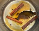 A picture of step 2 of Rakomelo | raki with honey | Greek traditional drink.