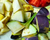 A picture of step 1 of Aloo baigun jhol.