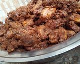A picture of step 4 of Party jollof rice with hot n spiced chicken and season salad.