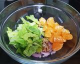 A picture of step 2 of Orange avocado salad.