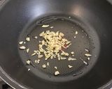A picture of step 3 of Scrambled egg with shrimp on rice.