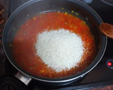 Foto del paso 4 de la receta: Arroz amarillo con calamares