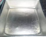 A picture of step 10 of Nariyal burfi.