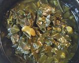 A picture of step 1 of Eggs over Collards.