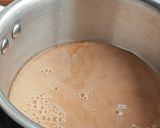 A picture of step 2 of Jaggery turmeric tea.
