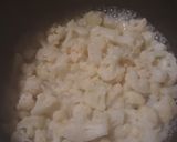 A picture of step 3 of Hominy and Cauliflower in a Cheesey Sauce.