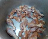 A picture of step 1 of Kache Ghosht Ki Biryani.