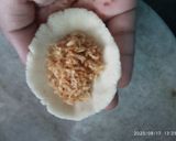 A picture of step 9 of Pitha (Bengali Coconut-Stuffed Pitha).