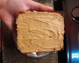 A picture of step 2 of Peanut butter jam sandwich.