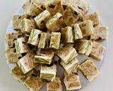 A picture of step 7 of White Chocolate and Pistachio Doukissa.