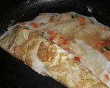 A picture of step 2 of Roll omlette.