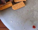 A picture of step 2 of Pepperoni olive mint skewers.