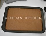 Foto langkah ke 12 dari resep Tokyo Banana Chocolate Roll Cake.