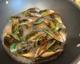 A picture of step 2 of Roasted Mussels with Garlic-Butter Crumbs.