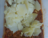 Foto del paso 7 de la receta: Patata rellena de Burritos, salsa BBQ, albahaca
