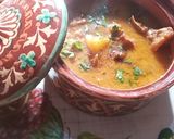 A picture of step 7 of Aloo gosht with roti.