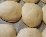 Foto del passaggio 3 della ricetta Bomboloni salati con ripieno di prosciutto cotto e scamorza
