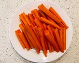 A picture of step 2 of Honey Butter Roasted Carrots.