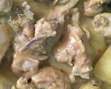 A picture of step 6 of Dahi Chicken.